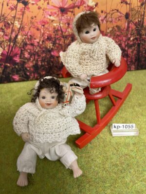 2 Porzellanbaby 3 Gesichter